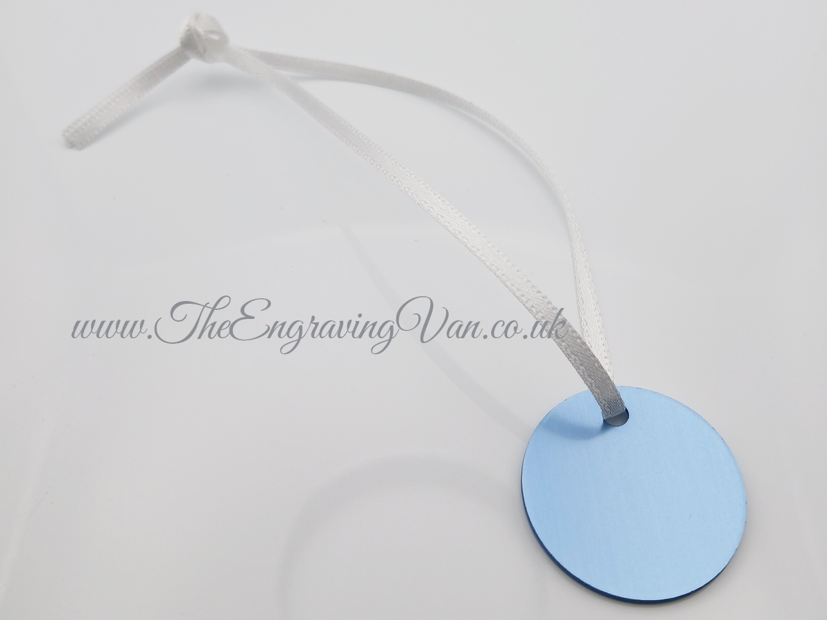 Small Pale Blue Disk on White Ribbon The Engraving Van
